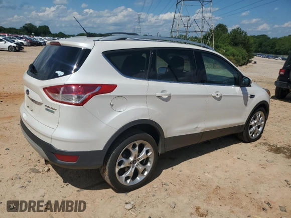 2013 Ford Escape Titanium with VIN 1FMCU0J98DUC67136, listed as a Copart auction lot 57967495 with 72,258 mi miles and Salvage title. Bid and sale history available at DreamBid. Image 3.
