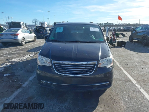 2016 Chrysler Town & Country Touring with VIN 2C4RC1BG7GR231704, listed as a IAAI auction lot 41306140 with 165,890 mi miles. Bid and sale history available at carsss.com. Image 12.