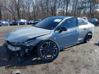 2023 Kia K5 GT-Line z VIN 5XXG64J28PG188506, wystawiony jako IAAI lot #41854184 z przebiegiem 18 967 mil mil oraz . Historia ofert i sprzedaży dostępna na DreamBid. Obrazek 18.