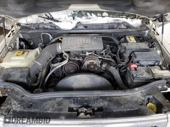 2010 Jeep Commander Sport z VIN 1J4RG4GK2AC158450, wystawiony jako Copart lot #46210865 z przebiegiem 222 500 mil mil oraz Szkoda całkowita • Salvage title. Historia ofert i sprzedaży dostępna na DreamBid. Obrazek 14.
