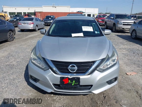 2018 Nissan Altima SR with VIN 1N4AL3AP6JC132730, listed as a IAAI auction lot 41585178 with 128,882 mi miles and . Bid and sale history available at DreamBid. Image 12.