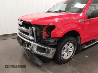 2015 Ford F-150 XLT with VIN 1FTEW1E85FFB26787, listed as a IAAI auction lot 42152326 with 61,825 mi miles and . Bid and sale history available at DreamBid. Image 6.
