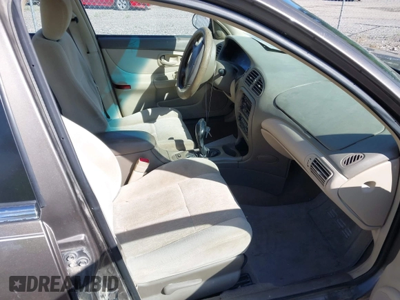 2001 Oldsmobile Intrigue GX z VIN 1G3WH52H11F148269, wystawiony jako IAAI lot #42238449 z przebiegiem Nie podano mil oraz . Historia ofert i sprzedaży dostępna na DreamBid. Obrazek 5.