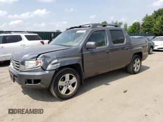 2012 Honda Ridgeline RTL z VIN 5FPYK1F59CB001005, wystawiony jako Copart lot #59713305 z przebiegiem 204 963 mil mil oraz Szkoda całkowita • Salvage title. Historia ofert i sprzedaży dostępna na DreamBid. Obrazek 1.