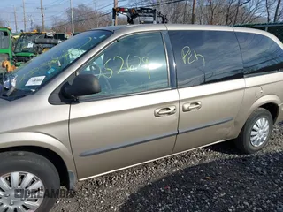 2003 Dodge Caravan Sport with VIN 2D4GP44R13R274458, listed as a IAAI auction lot 41788865 with 999,999 mi miles. Bid and sale history available at carsss.com. Image 6.