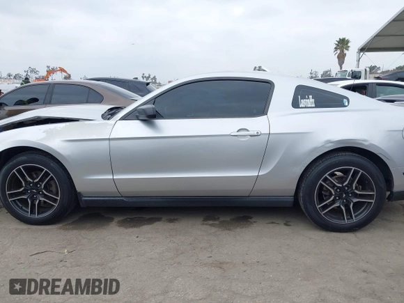 2012 Ford Mustang V6 Premium with VIN 1ZVBP8AM6C5211339, listed as a IAAI auction lot 42107541 with 164,678 mi miles. Bid and sale history available at carsss.com. Image 14.