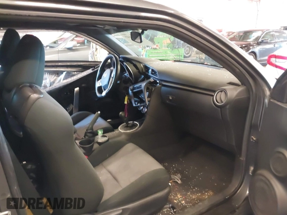 2014 Scion tC with VIN JTKJF5C77E3069906, listed as a IAAI auction lot 41243445 with 128,791 mi miles. Bid and sale history available at carsss.com. Image 5.