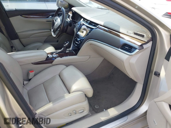 2013 Cadillac XTS Premium z VIN 2G61S5S35D9143656, wystawiony jako IAAI lot #42099511 z przebiegiem 207 055 mil mil oraz . Historia ofert i sprzedaży dostępna na DreamBid. Obrazek 5.