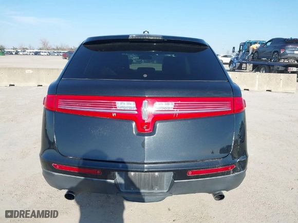 2014 Lincoln MKT EcoBoost with VIN 2LMHJ5AT3EBL56146, listed as a IAAI auction lot 41592528 with 141,688 mi miles. Bid and sale history available at carsss.com. Image 16.