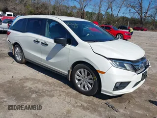 2019 Honda Odyssey LX with VIN 5FNRL6H23KB049236, listed as a IAAI auction lot 41633339 with 96,000 mi miles and . Bid and sale history available at DreamBid. Image 1.