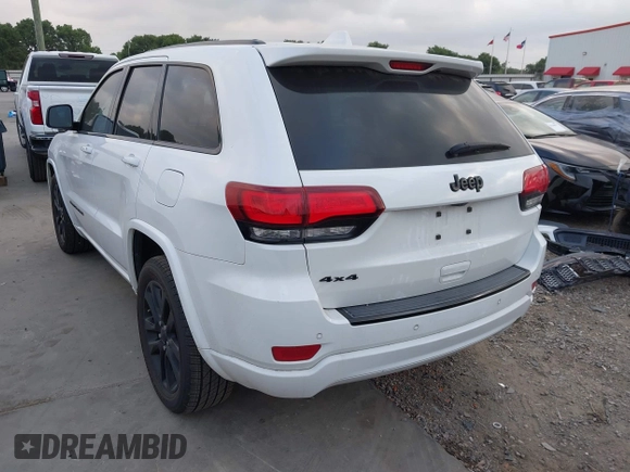 2017 Jeep Grand Cherokee Altitude z VIN 1C4RJFAG3HC707171, wystawiony jako IAAI lot #42145431 z przebiegiem 82 199 mil mil oraz . Historia ofert i sprzedaży dostępna na DreamBid. Obrazek 3.