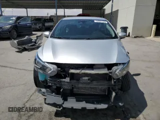 2021 Nissan Versa SV z VIN 3N1CN8EV1ML888089, wystawiony jako Copart lot #52027585 z przebiegiem 65 944 mil mil oraz Szkoda całkowita • Salvage title. Historia ofert i sprzedaży dostępna na DreamBid. Obrazek 5.