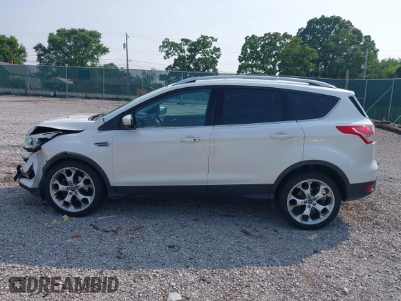2015 Ford Escape Titanium with VIN 1FMCU0JXXFUA07175, listed as a IAAI auction lot 42447067 with 94,893 mi miles and . Bid and sale history available at DreamBid. Image 14.