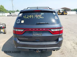 2015 Dodge Durango SXT with VIN 1C4RDHAG7FC869904, listed as a IAAI auction lot 42491906 with 120,396 mi miles and . Bid and sale history available at DreamBid. Image 16.