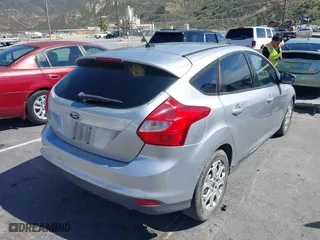 2012 Ford Focus SE with VIN 1FAHP3K28CL343856, listed as a IAAI auction lot 41990103 with 176,588 mi miles. Bid and sale history available at carsss.com. Image 4.