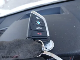 2018 BMW X1 xDrive28i with VIN WBXHT3C32J5K29627, listed as a IAAI auction lot 40995212 with 64,162 mi miles. Bid and sale history available at carsss.com. Image 11.