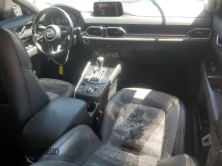 2018 Mazda CX-5 Grand Touring with VIN JM3KFADM9J0343621, listed as a Copart auction lot 52284475 with 129,776 mi miles and Salvage Title. Bid and sale history available at DreamBid. Image 8.