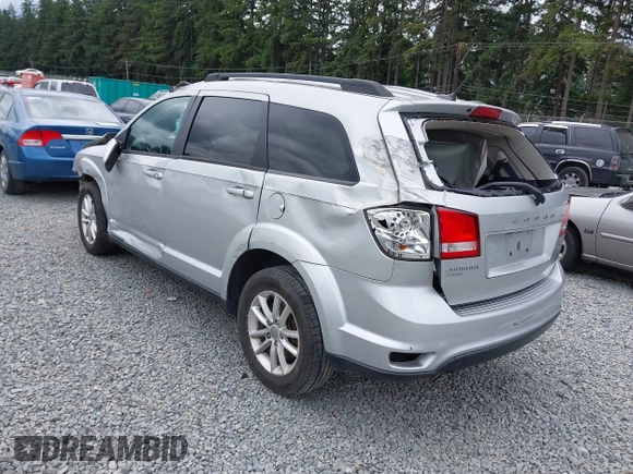 2013 Dodge Journey SXT with VIN 3C4PDDBG1DT507356, listed as a IAAI auction lot 42592501 with 128,094 mi miles and . Bid and sale history available at DreamBid. Image 3.