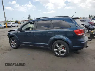 2013 Dodge Journey SE with VIN 3C4PDCAB7DT680055, listed as a Copart auction lot 58241435 with 199,620 mi miles and Salvage title. Bid and sale history available at DreamBid. Image 2.