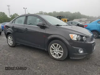 2015 Chevrolet Sonic LT with VIN 1G1JC5SG2F4212010, listed as a Copart auction lot 58732505 with 39,299 mi miles and Salvage title. Bid and sale history available at DreamBid. Image 4.