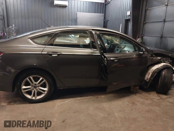 2018 Ford Fusion SE with VIN 3FA6P0HD5JR207844, listed as a IAAI auction lot 42534696 with 93,360 mi miles and . Bid and sale history available at DreamBid. Image 14.