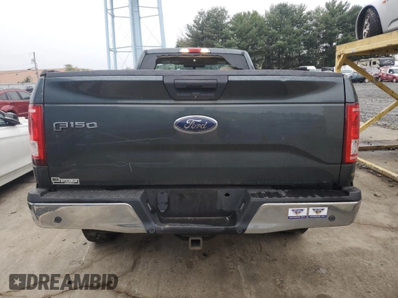 2015 Ford F-150 XL with VIN 1FTNF1EG1FKD00398, listed as a Copart auction lot 72774054 with 164,052 mi miles and Salvage title. Bid and sale history available at DreamBid. Image 6.