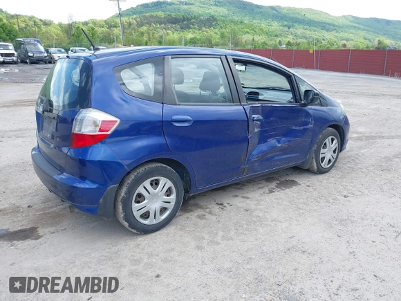 2009 Honda Fit with VIN JHMGE882X9S058976, listed as a IAAI auction lot 42202305 with 121,633 mi miles and . Bid and sale history available at DreamBid. Image 4.