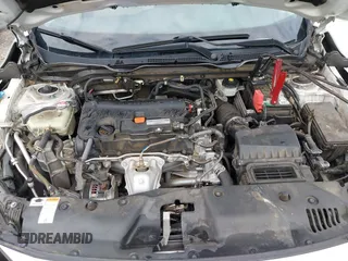 2020 Honda Civic LX с VIN 19XFC2F67LE015275, выставлен на аукционе IAAI как лот 42199717 с пробегом 141 018 миль миль и . История ставок и продаж доступна на DreamBid. Изображение 10.