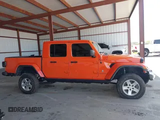 2020 Jeep Gladiator Overland z VIN 1C6HJTFG4LL154369, wystawiony jako IAAI lot #42681844 z przebiegiem 76 374 mil mil oraz . Historia ofert i sprzedaży dostępna na DreamBid. Obrazek 13.