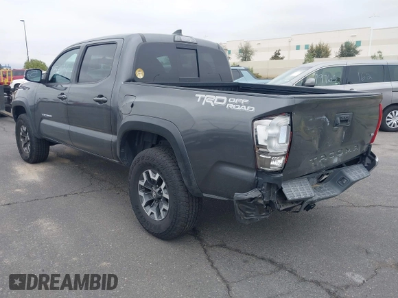 2017 Toyota Tacoma SR5 z VIN 3TMAZ5CN7HM045752, wystawiony jako IAAI lot #42057874 z przebiegiem 89 898 mil mil oraz . Historia ofert i sprzedaży dostępna na DreamBid. Obrazek 3.