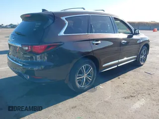 2019 Infiniti QX60 Pure with VIN 5N1DL0MM4KC569307, listed as a IAAI auction lot 42300605 with 40,336 mi miles and . Bid and sale history available at DreamBid. Image 4.