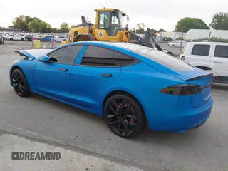2013 Tesla Model S Performance with VIN 5YJSA1DP5DFP25345, listed as a IAAI auction lot 42288379 with 165,915 mi miles and . Bid and sale history available at DreamBid. Image 3.