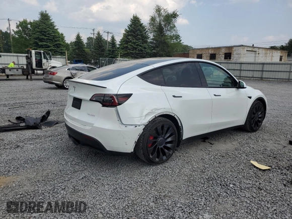 2022 Tesla Model Y Performance with VIN 7SAYGDEF1NF445085, listed as a Copart auction lot 58809495 with 14,832 mi miles and Salvage title. Bid and sale history available at DreamBid. Image 3.
