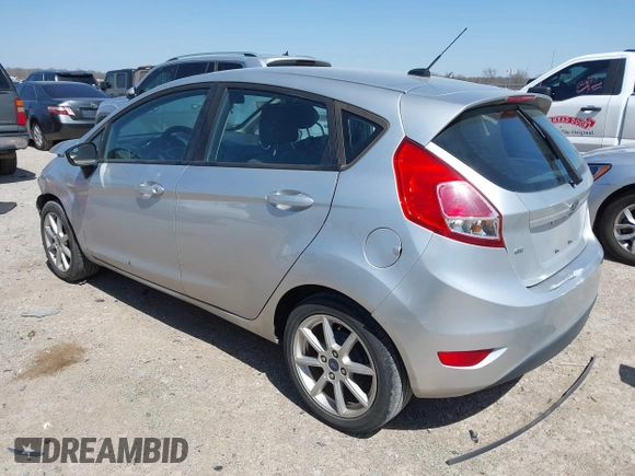 2019 Ford Fiesta SE with VIN 3FADP4EJ0KM148614, listed as a IAAI auction lot 41860070 with 68,361 mi miles and . Bid and sale history available at DreamBid. Image 3.
