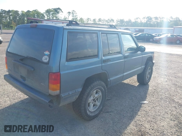 1999 Jeep Cherokee Sport with VIN 1J4FT68S9XL581835, listed as a IAAI auction lot 42499071 with 203,782 mi miles and . Bid and sale history available at DreamBid. Image 4.