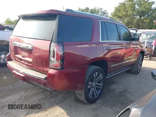 2017 GMC Yukon Denali with VIN 1GKS1CKJ4HR141145, listed as a IAAI auction lot 40799652 with 104,369 mi miles. Bid and sale history available at carsss.com. Image 4.