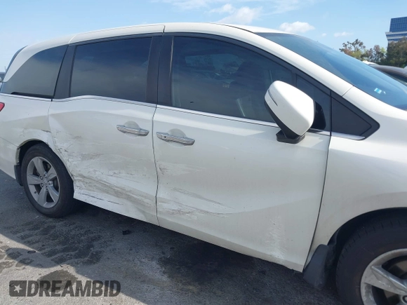 2019 Honda Odyssey EX-L with VIN 5FNRL6H74KB103686, listed as a IAAI auction lot 41948433 with 78,506 mi miles. Bid and sale history available at carsss.com. Image 6.