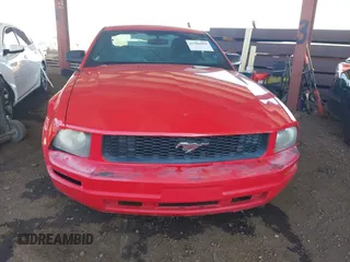 2007 Ford Mustang Deluxe z VIN 1ZVFT80NX75354713, wystawiony jako IAAI lot #41986604 z przebiegiem 156 691 mil mil oraz . Historia ofert i sprzedaży dostępna na DreamBid. Obrazek 13.