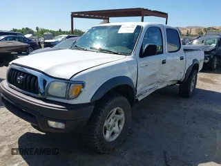 2001 Toyota Tacoma PreRunner z VIN 5TEGN92N91Z852586, wystawiony jako IAAI lot #42299321 z przebiegiem 233 111 mil mil oraz . Historia ofert i sprzedaży dostępna na DreamBid. Obrazek 2.