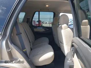 2005 GMC Envoy SLE with VIN 1GKDT13S252264932, listed as a IAAI auction lot 41981566 with 140,566 mi miles. Bid and sale history available at carsss.com. Image 8.