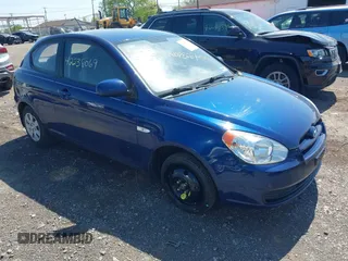 2011 Hyundai Accent GS z VIN KMHCM3AC6BU201937, wystawiony jako IAAI lot #42238069 z przebiegiem 106 922 mil mil oraz . Historia ofert i sprzedaży dostępna na DreamBid. Obrazek 1.