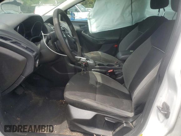2012 Ford Focus SE with VIN 1FAHP3F29CL192410, listed as a Copart auction lot 56428525 with 76,671 mi miles and Clean title. Bid and sale history available at DreamBid. Image 7.