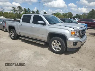 2015 GMC Sierra 1500 SLT with VIN 3GTU2VEC3FG452279, listed as a Copart auction lot 50274495 with 119,964 mi miles and Salvage Title. Bid and sale history available at DreamBid. Image 4.
