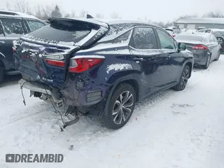 2017 Lexus RX with VIN 2T2BZMCA0HC104477, listed as a IAAI auction lot 41304849 with 98,888 mi miles. Bid and sale history available at carsss.com. Image 4.