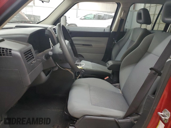 2007 Jeep Patriot Sport with VIN 1J8FT28W67D358205, listed as a Copart auction lot 52323215 with 133,212 mi miles and Salvage Title. Bid and sale history available at DreamBid. Image 7.
