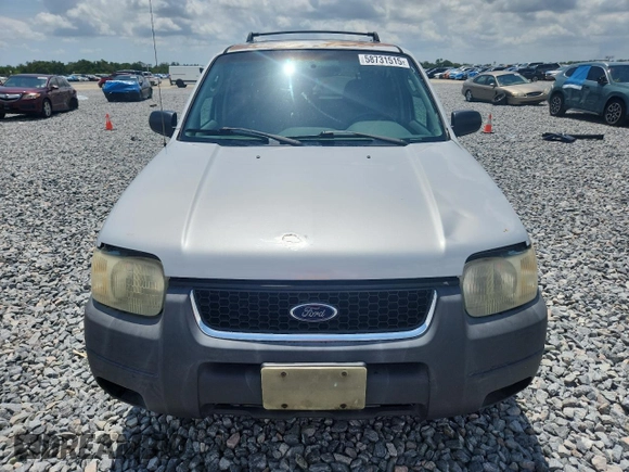 2003 Ford Escape XLT Popular with VIN 1FMYU03103KA06199, listed as a Copart auction lot 58731515 with 181,429 mi miles and Salvage title. Bid and sale history available at DreamBid. Image 5.