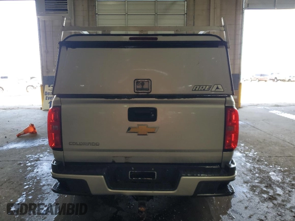 2015 Chevrolet Colorado z VIN 1GCHSAE39F1264570, wystawiony jako Copart lot #49677645 z przebiegiem 105 800 mil mil oraz Czysty tytuł • Clean title. Historia ofert i sprzedaży dostępna na DreamBid. Obrazek 6.