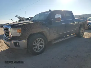 2015 GMC Sierra 1500 SLT with VIN 3GTU2VEJ0FG384652, listed as a Copart auction lot 83015254 with 179,759 mi miles and Salvage Title. Bid and sale history available at DreamBid. Image 1.