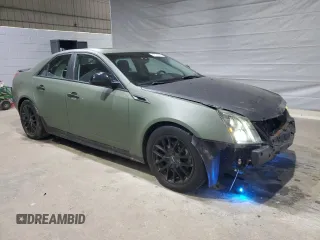 2011 Cadillac CTS Premium with VIN 1G6DS5ED9B0108868, listed as a Copart auction lot 48022825 with 128,624 mi miles and Salvage Title. Bid and sale history available at carsss.com. Image 4.