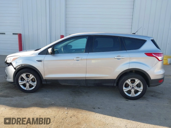2016 Ford Escape SE with VIN 1FMCU9GX0GUA13421, listed as a IAAI auction lot 41788760 with 123,062 mi miles and . Bid and sale history available at DreamBid. Image 15.